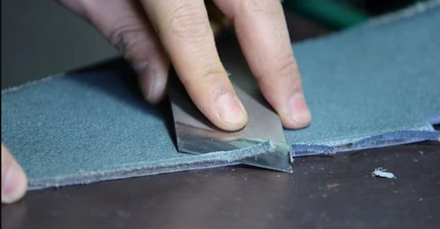 Cut a small leather strip