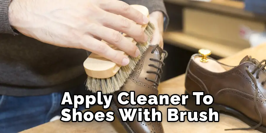 Apply Cleaner to Shoes with Brush