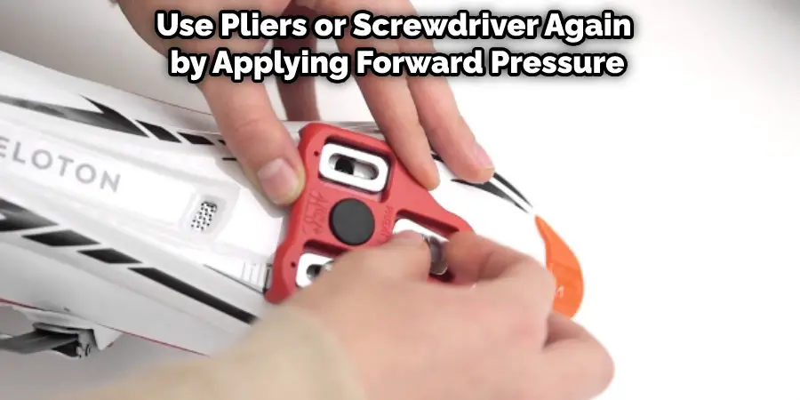 Use Pliers or Screwdriver Again by Applying Forward Pressure