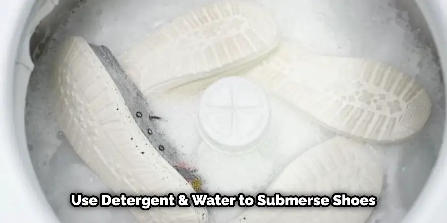 Use Detergent & Water to Submerse Shoes 