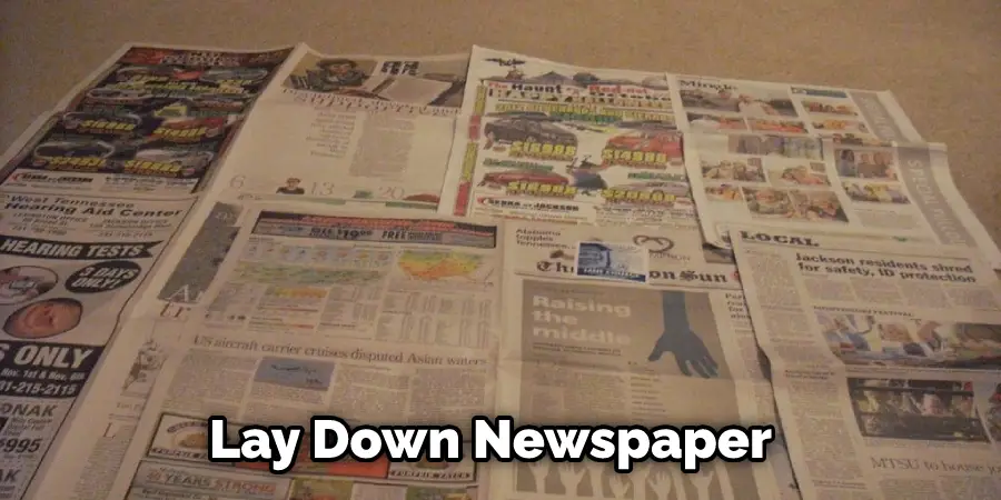 Lay Down Newspaper