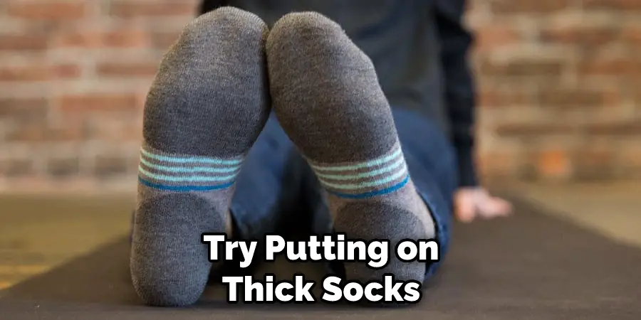 Try Putting on Thick Socks
